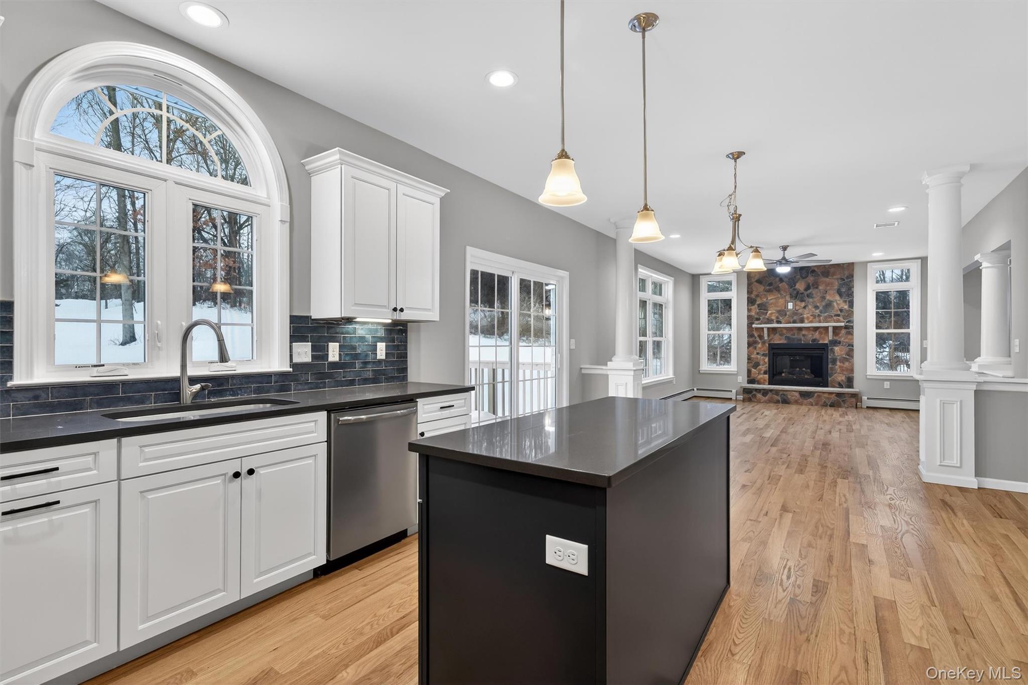 509 Toleman Road Rock Tavern, NY 12575 - Photo 20 of 36 a kitchen with sink stove and wooden floor