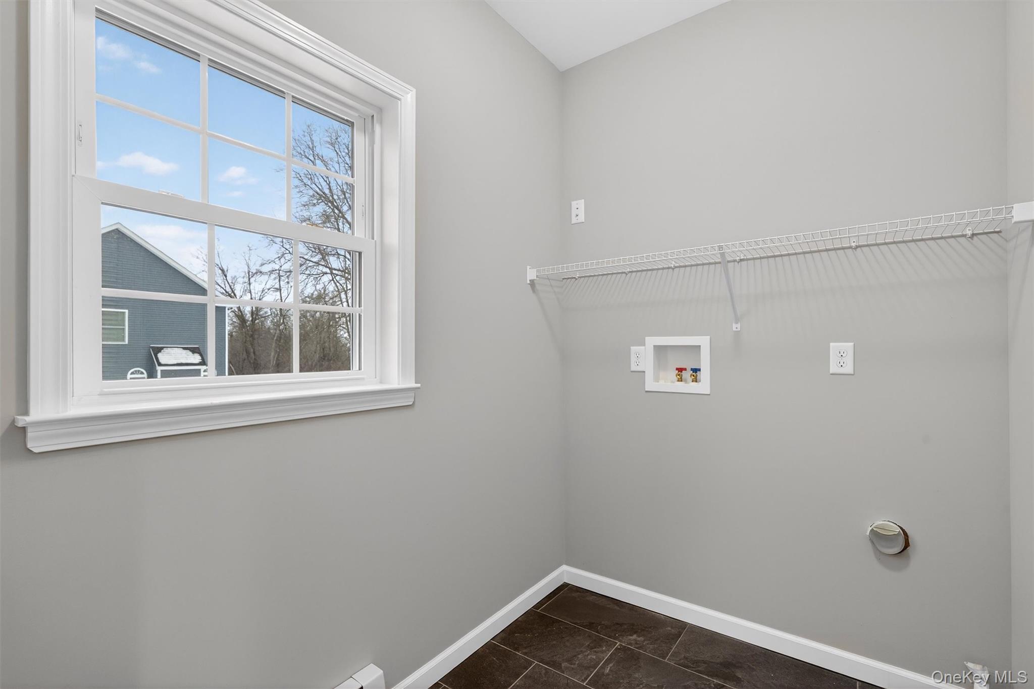 509 Toleman Road Rock Tavern, NY 12575 - Photo 22 of 36 a view of a small space with wooden floor and a window