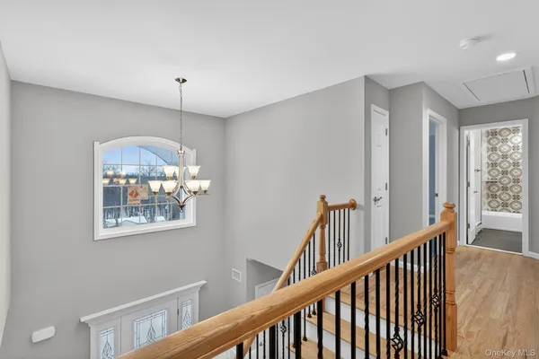 a view of entryway with wooden floor