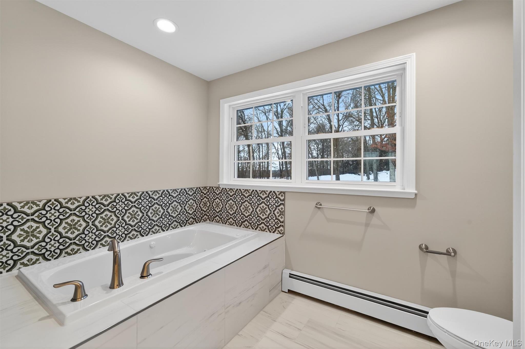 509 Toleman Road Rock Tavern, NY 12575 - Photo 33 of 36 a bathroom with a bathtub