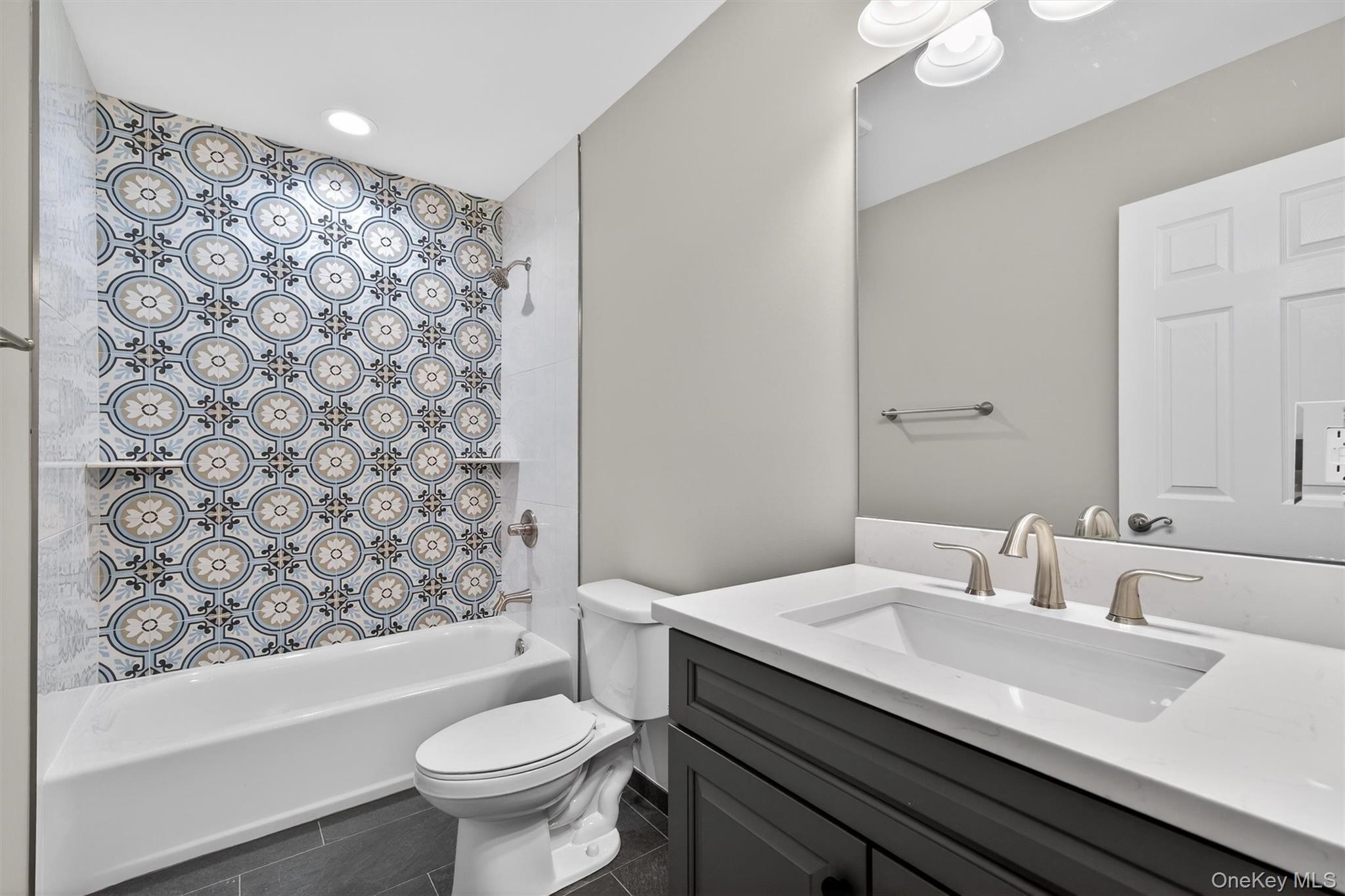 509 Toleman Road Rock Tavern, NY 12575 - Photo 35 of 36 a bathroom with a sink toilet and a mirror