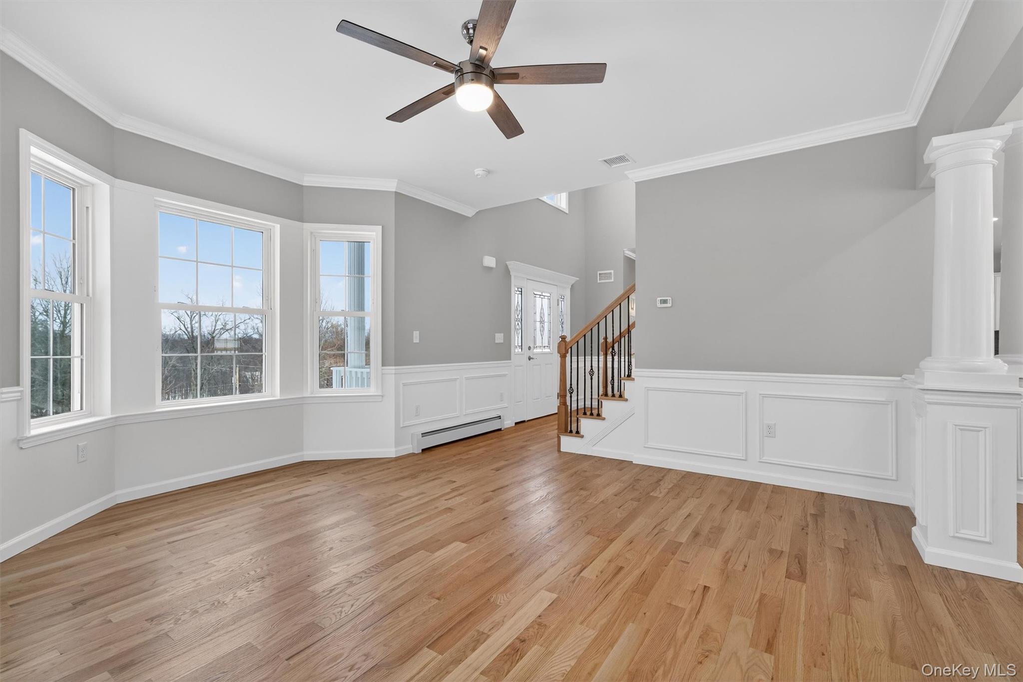 509 Toleman Road Rock Tavern, NY 12575 - Photo 7 of 36 a view of an empty room with wooden floor and a window