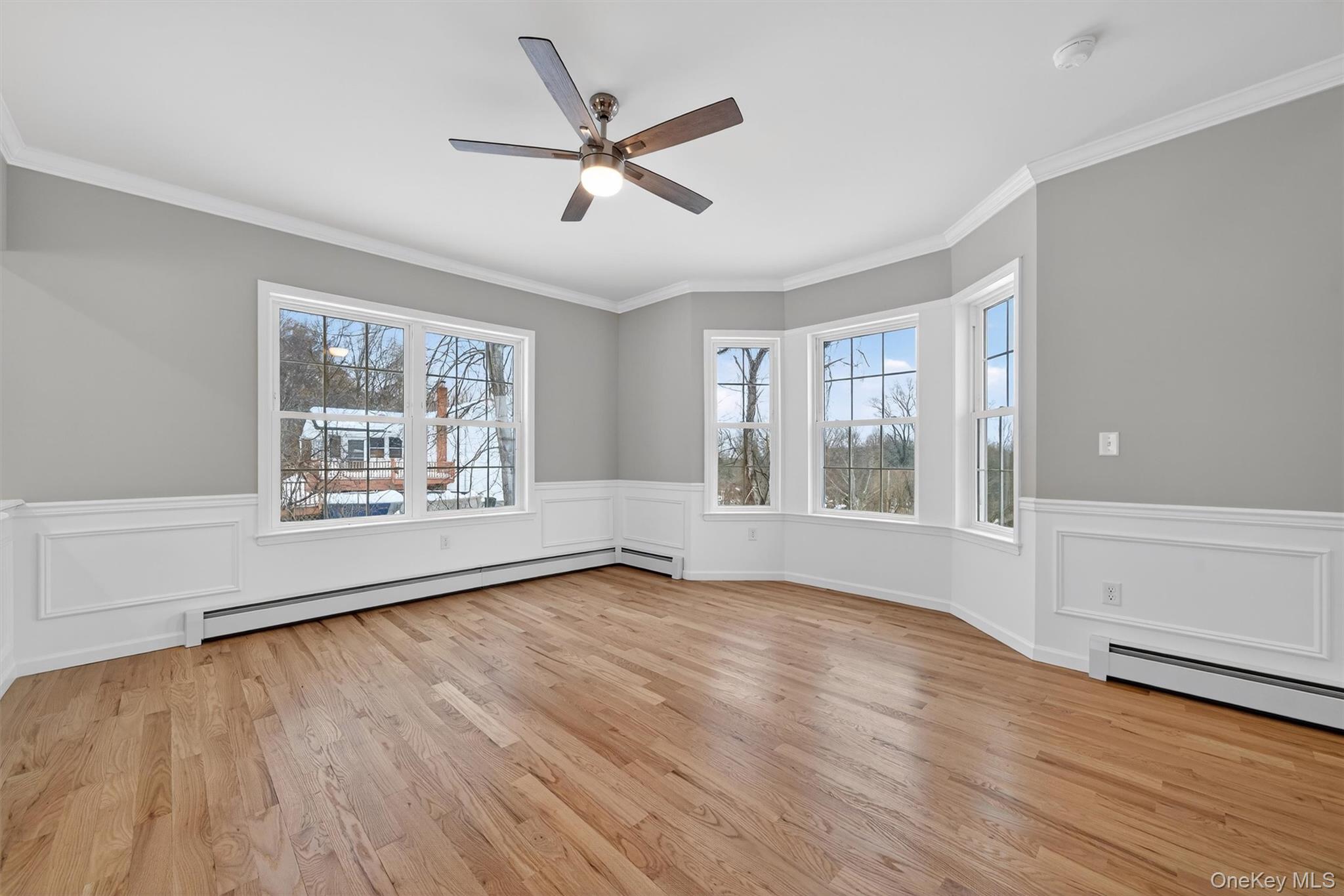 509 Toleman Road Rock Tavern, NY 12575 - Photo 8 of 36 a view of an empty room with wooden floor and a window