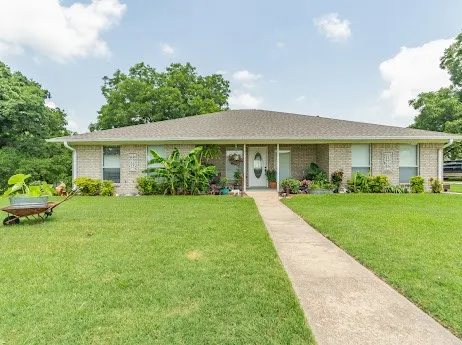an outdoor space with furniture and a fireplace