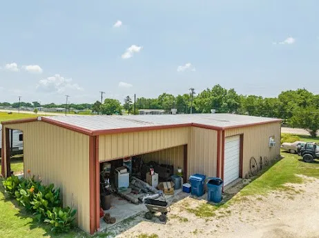 a view of an ocean and a yard