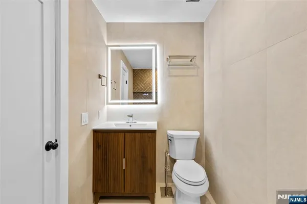 a bathroom with a sink and a window