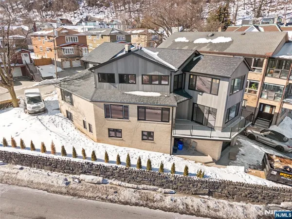 front view of a house with a street