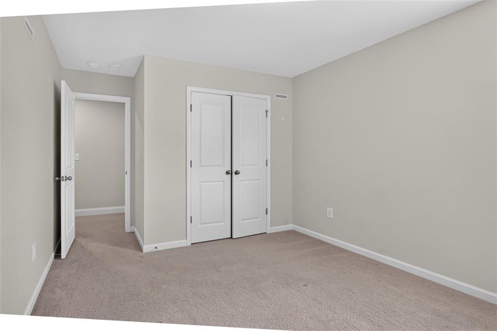 107 Ledgemont Way Acworth, GA 30101 - Photo 33 of 57 a view of an empty room