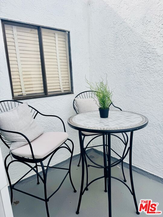 14 Mast Street Marina del Rey, CA 90292 - Photo 27 of 32 a view of a dining room with furniture and window