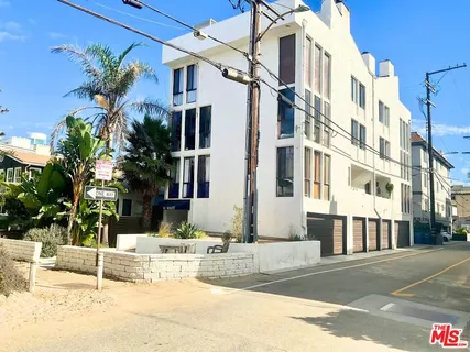 a view of a building with a street
