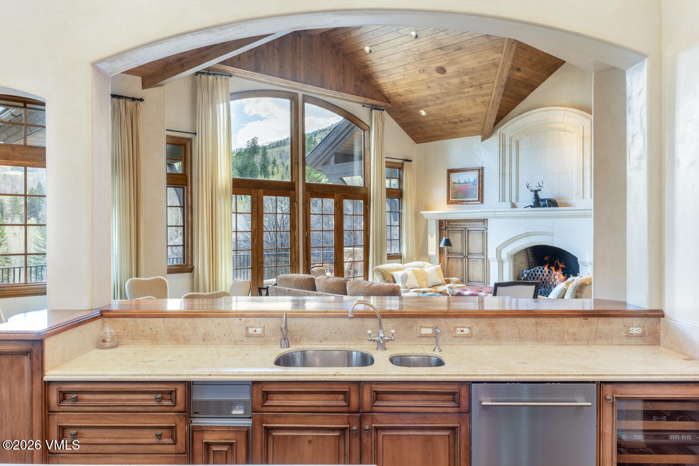 312 Holden Road Beaver Creek, CO 81620 - Photo 19 of 45 a view of a kitchen with granite countertop a sink and a stove