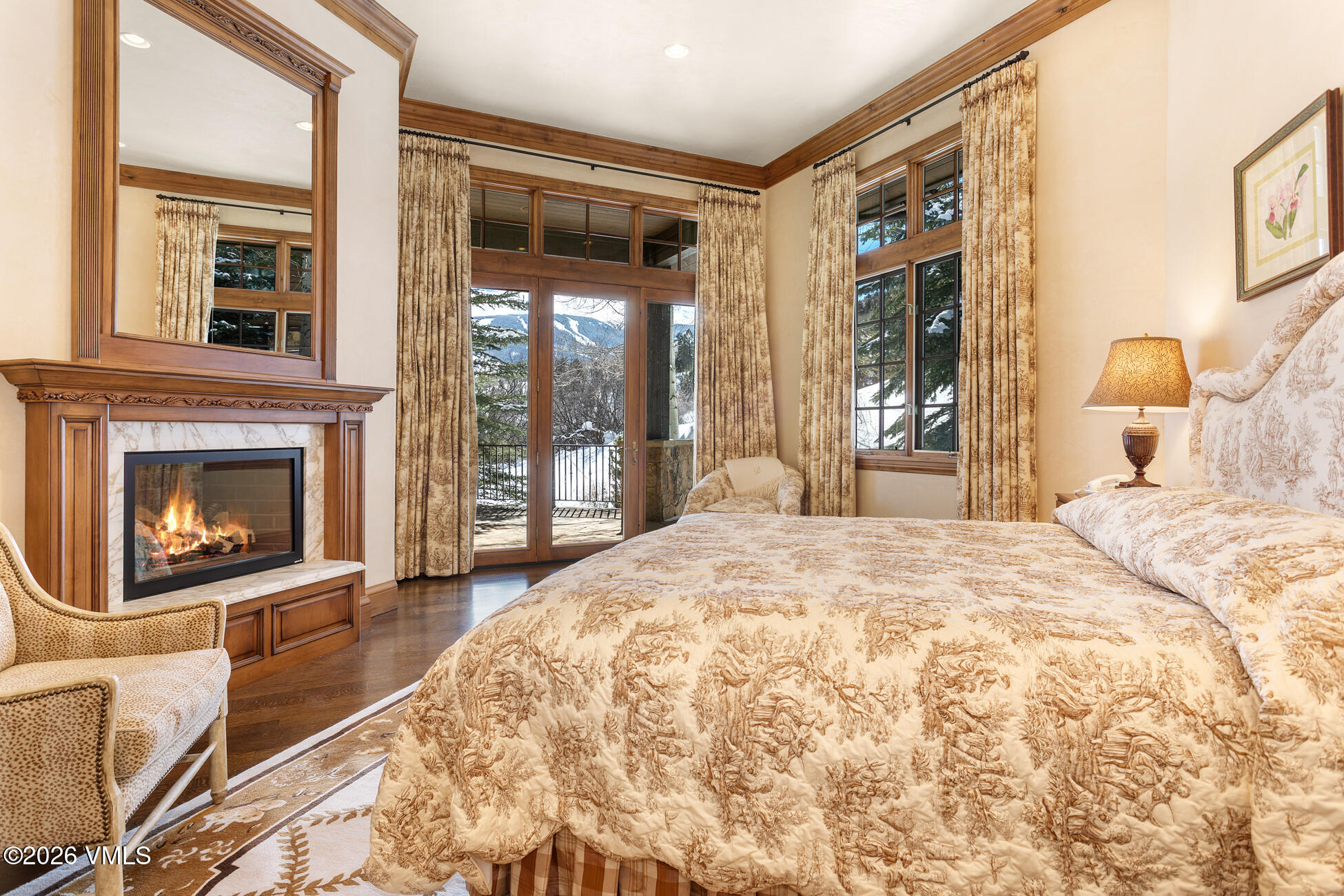 312 Holden Road Beaver Creek, CO 81620 - Photo 22 of 45 a bedroom with a bed and a fireplace