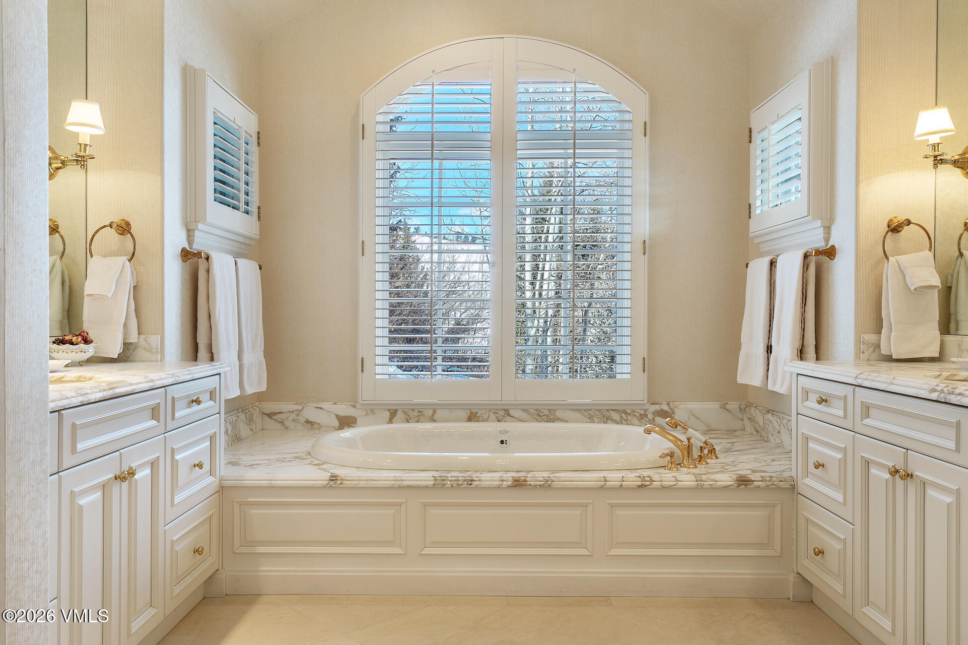 312 Holden Road Beaver Creek, CO 81620 - Photo 24 of 45 a spacious bathroom with bathtub and windows