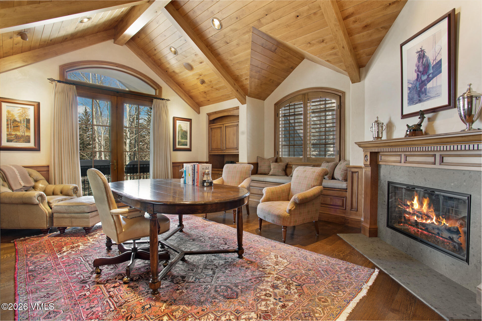 312 Holden Road Beaver Creek, CO 81620 - Photo 29 of 45 a living room with furniture a fireplace and a large window