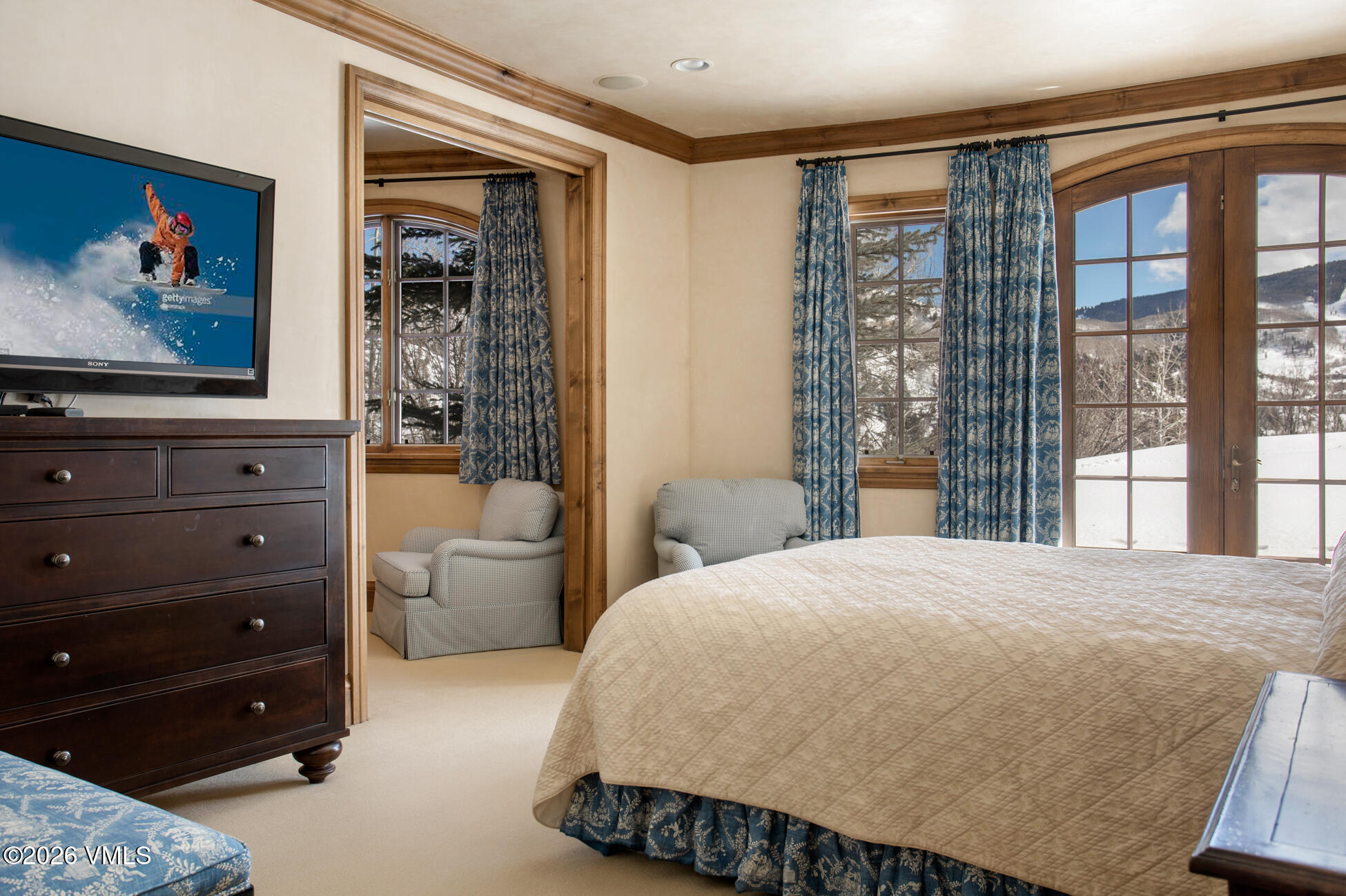 312 Holden Road Beaver Creek, CO 81620 - Photo 34 of 45 a bedroom with a large bed and a window