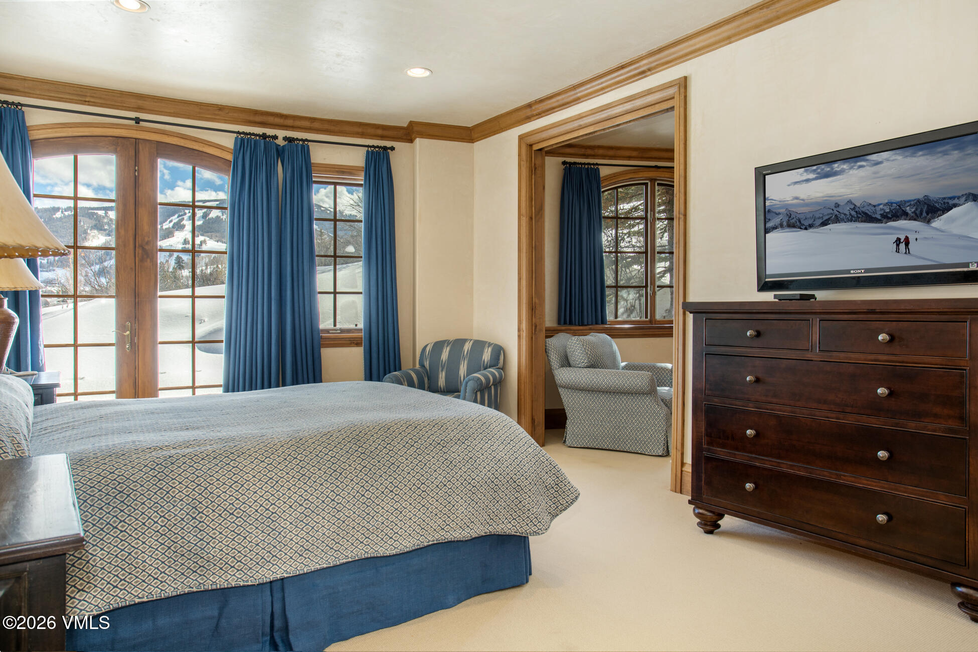 312 Holden Road Beaver Creek, CO 81620 - Photo 36 of 45 a bedroom with a bed and a large window