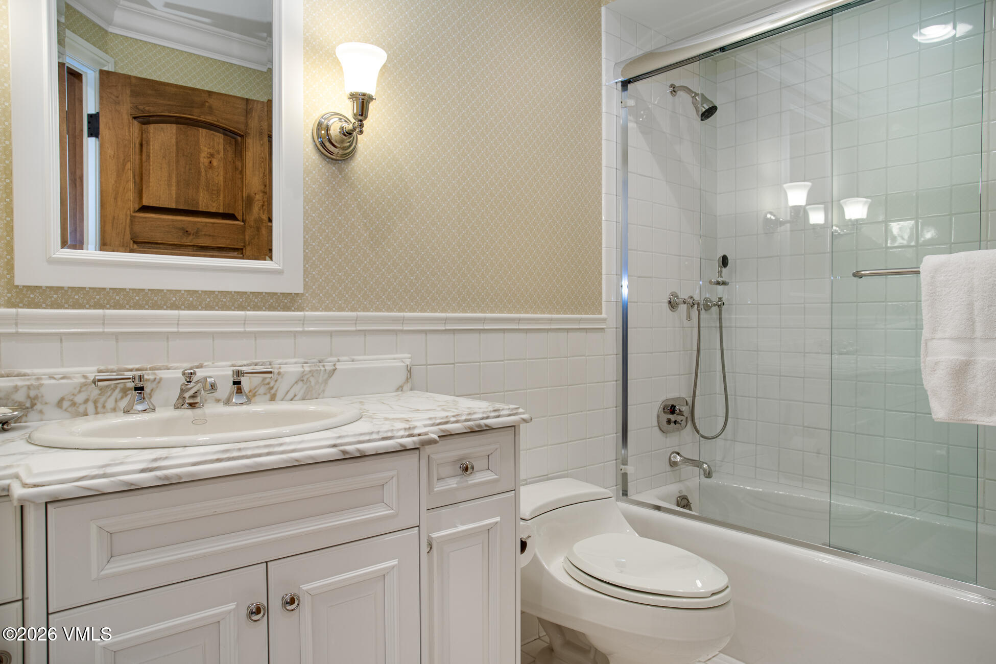 312 Holden Road Beaver Creek, CO 81620 - Photo 41 of 45 a bathroom with a granite countertop sink toilet and shower