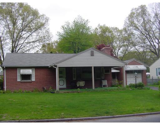 5 Anglesea Street Springfield, MA 01108 - Photo 1 of 1 a front view of a house with a garden