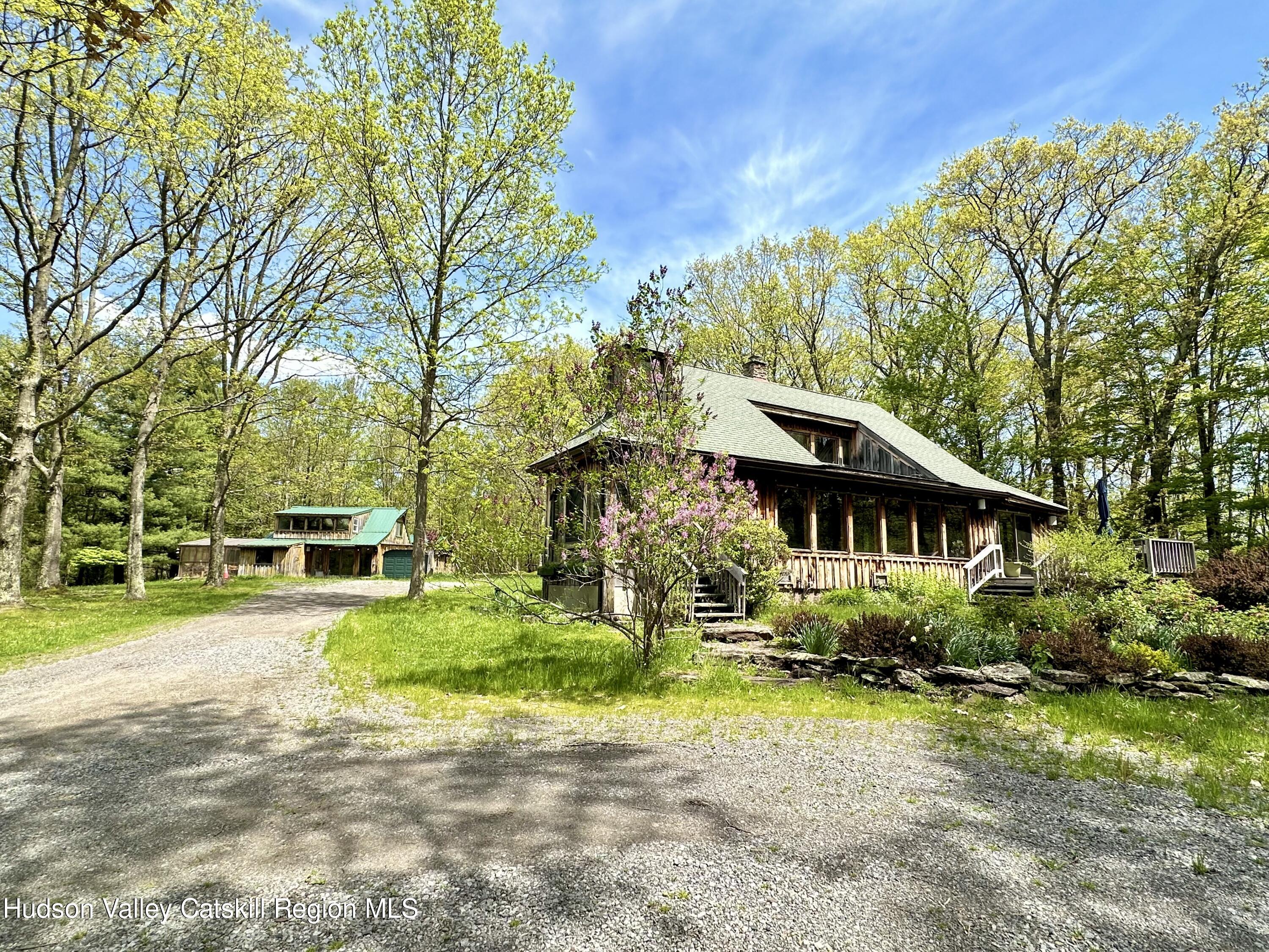 978 Scott Greene Road Roxbury, NY 12474 - Photo 29 of 41 front view of a house with a yard