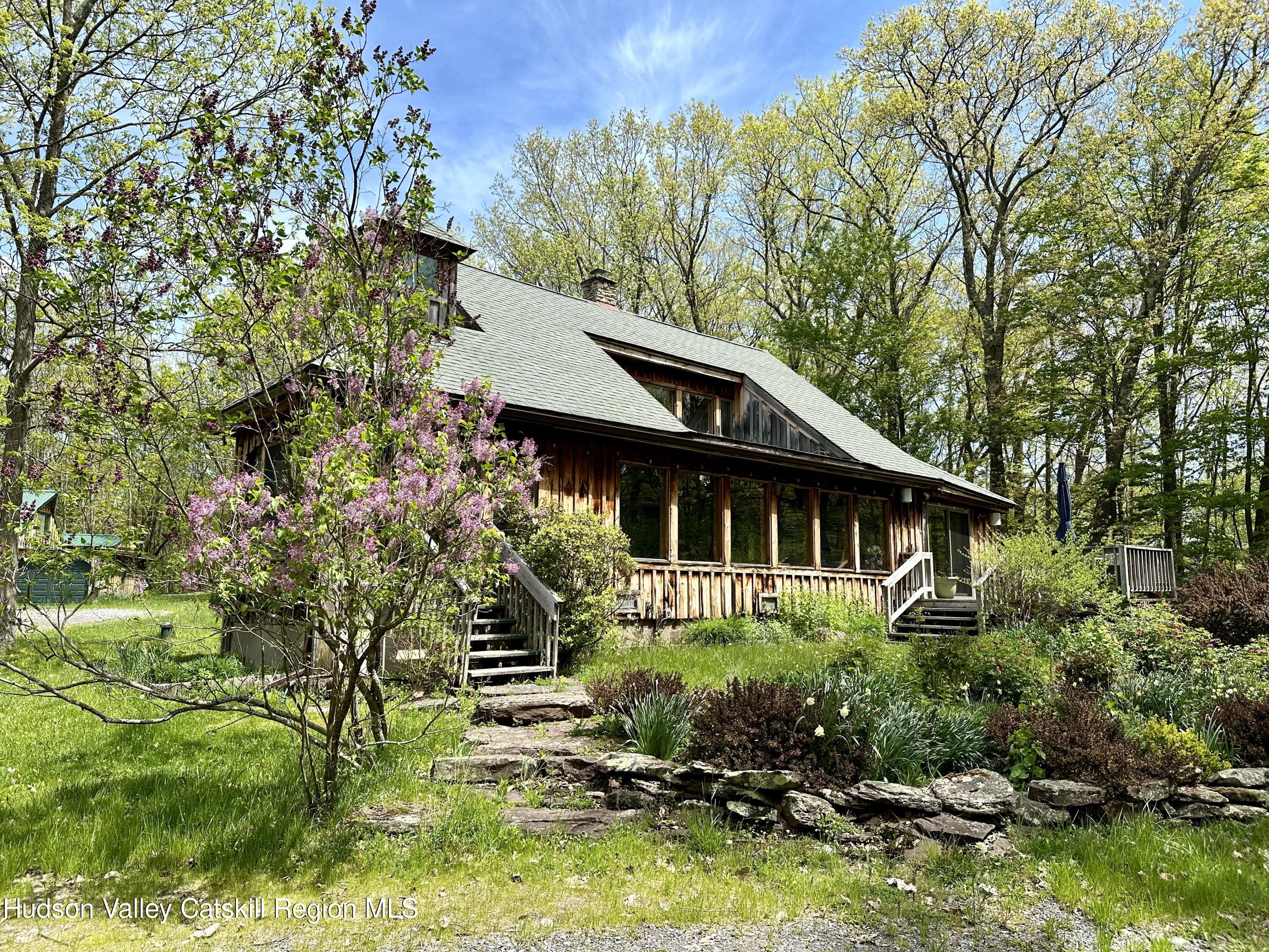 978 Scott Greene Road Roxbury, NY 12474 - Photo 34 of 41 a backyard of a house with lots of green space