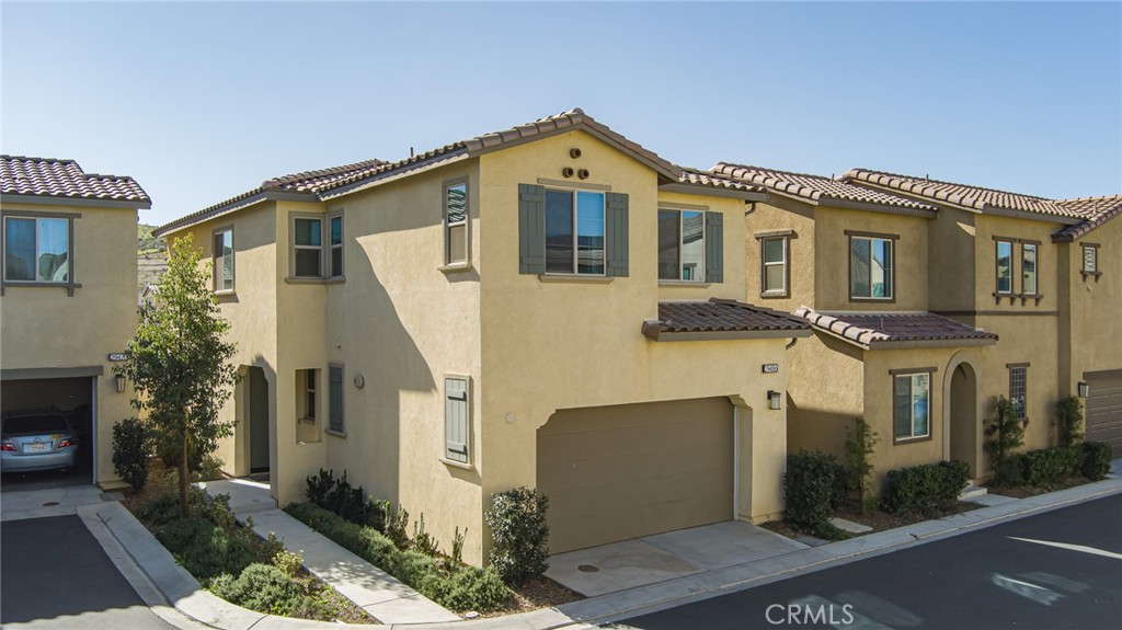 29486 Marx Way Winchester, CA 92596 - Photo 1 of 44 a front view of a house with a yard