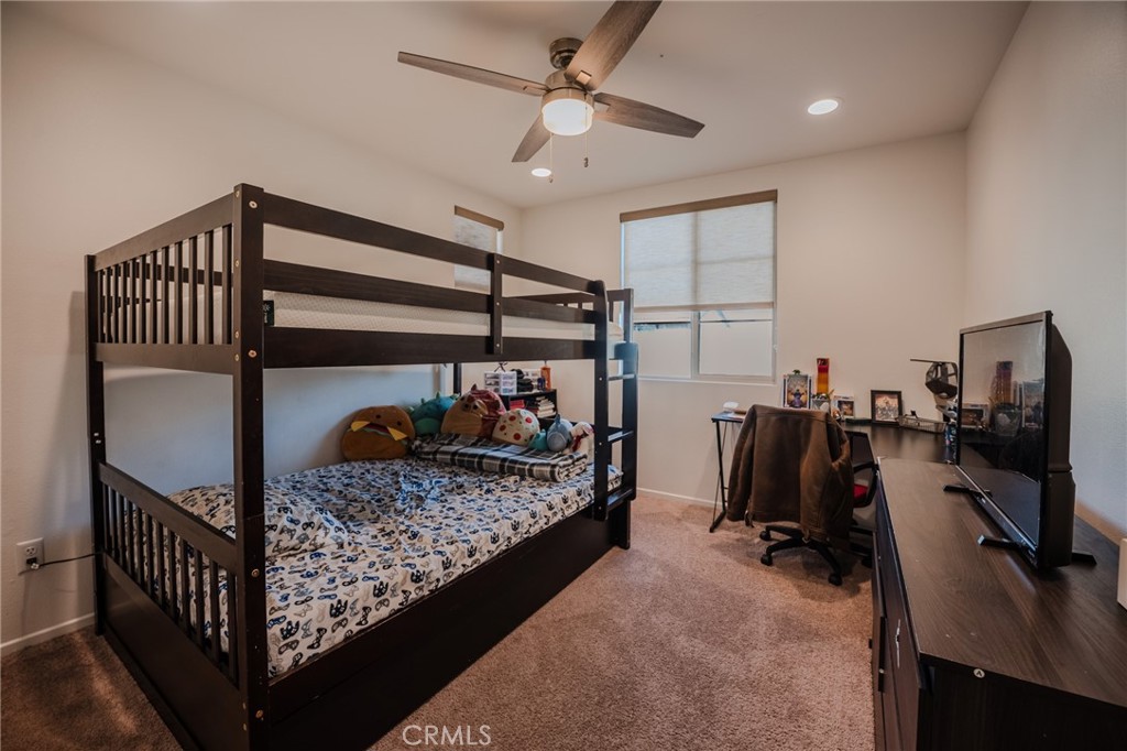 29486 Marx Way Winchester, CA 92596 - Photo 24 of 44 a bed room with furniture and a window