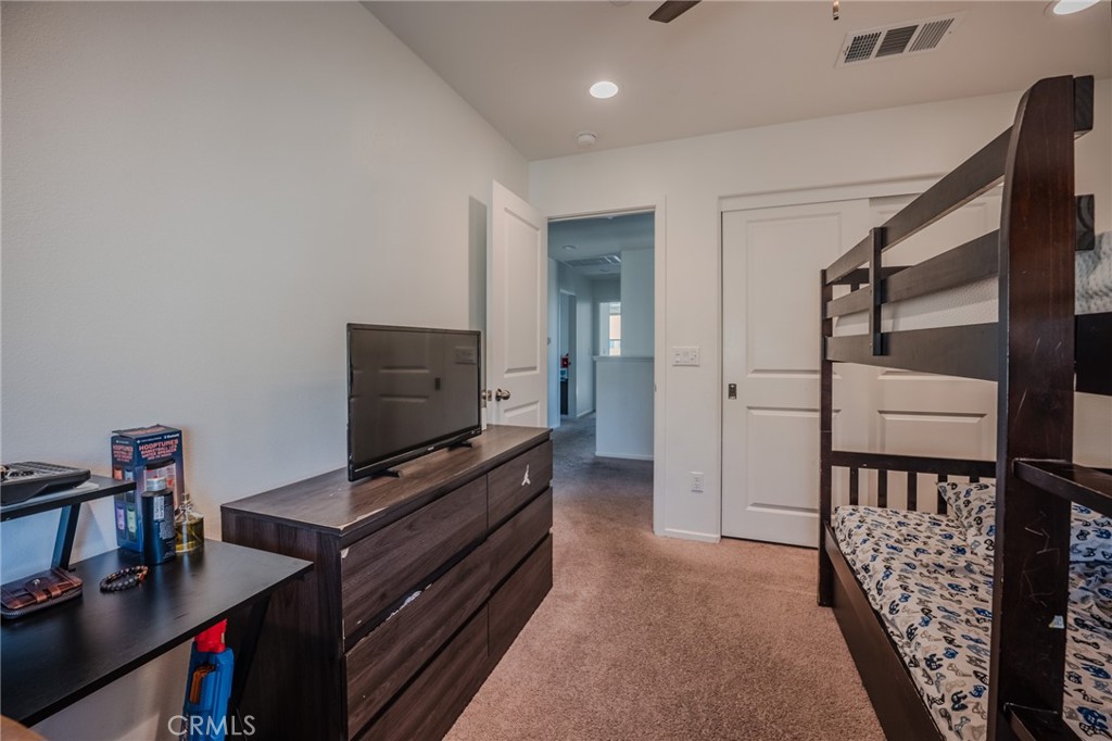 29486 Marx Way Winchester, CA 92596 - Photo 25 of 44 a living room with furniture and flat screen tv