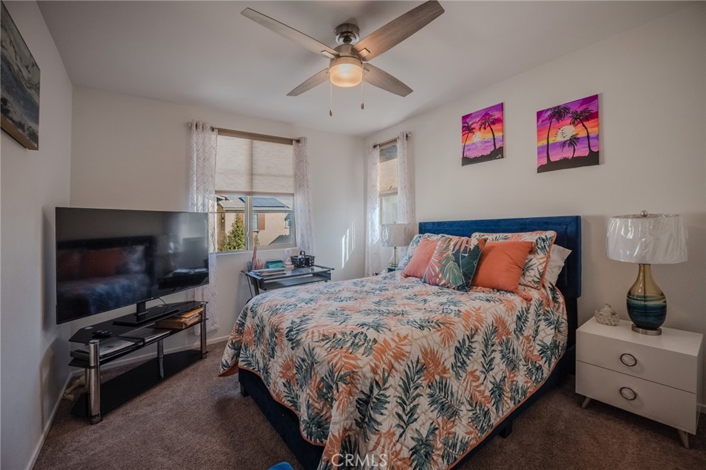 29486 Marx Way Winchester, CA 92596 - Photo 26 of 44 a bedroom with bed and flat screen tv
