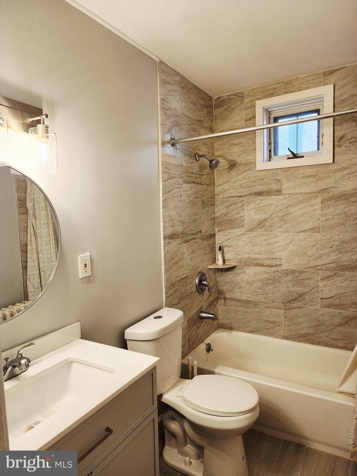 208 West Wayne Avenue Wayne, PA 19087 - Photo 7 of 9 a bathroom with a sink toilet and shower