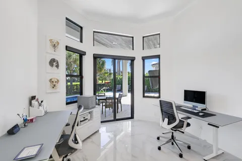 a bathroom with a sink vanity granite and a mirror