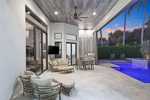 an aerial view of residential houses with outdoor space