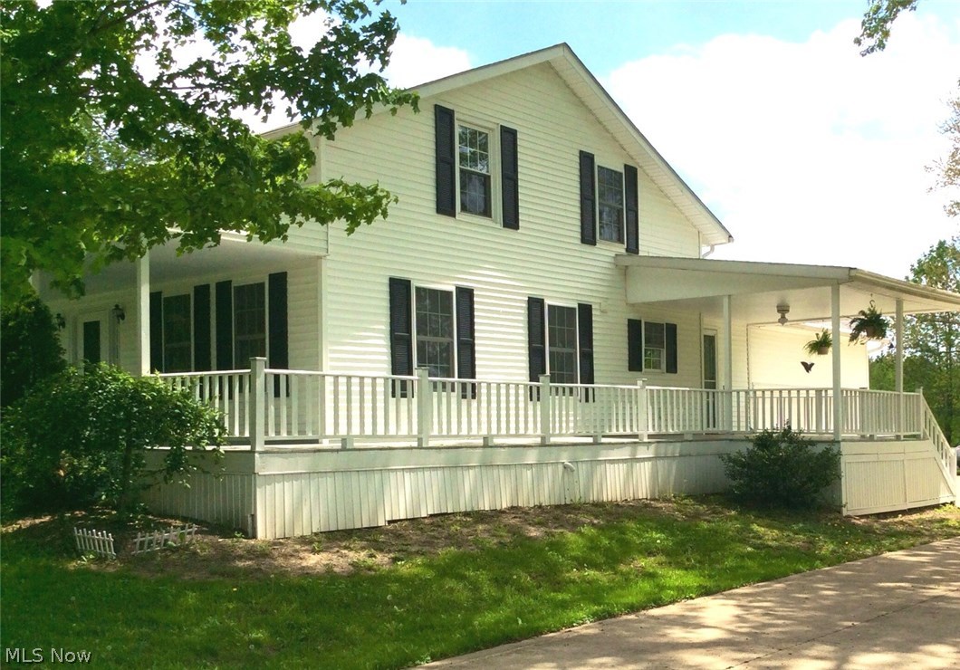 3488 Hamilton Road Medina, OH 44256 - Photo 3 of 18 FANTASTIC WRAPAROUND PORCH TO ENJOY MORNING BREAKFAST OR WATCH EVENING SUNSETS.