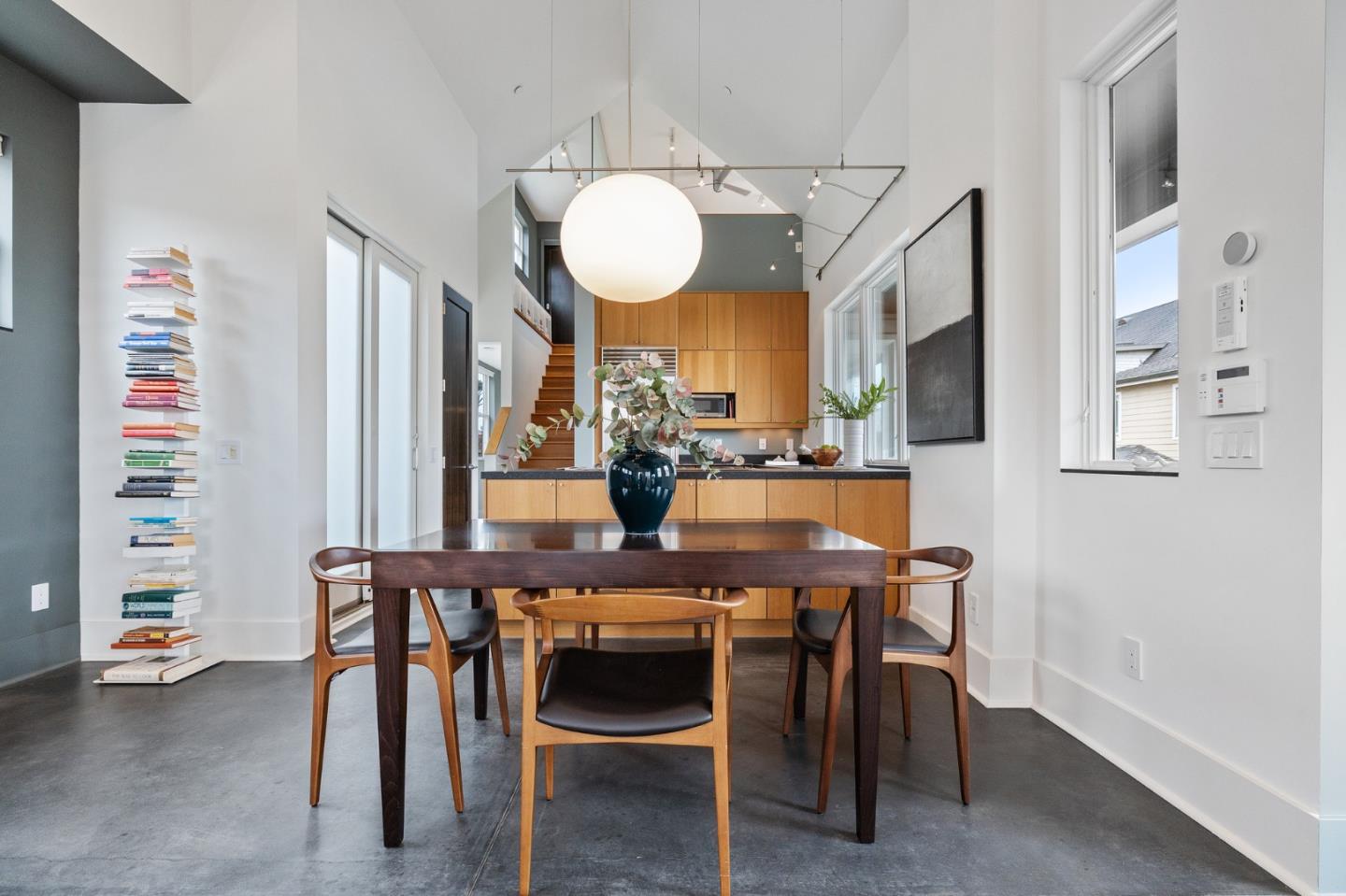 100 Coronado Avenue Half Moon Bay, CA 94019 - Photo 13 of 64 a view of a dining room with furniture and wooden floor