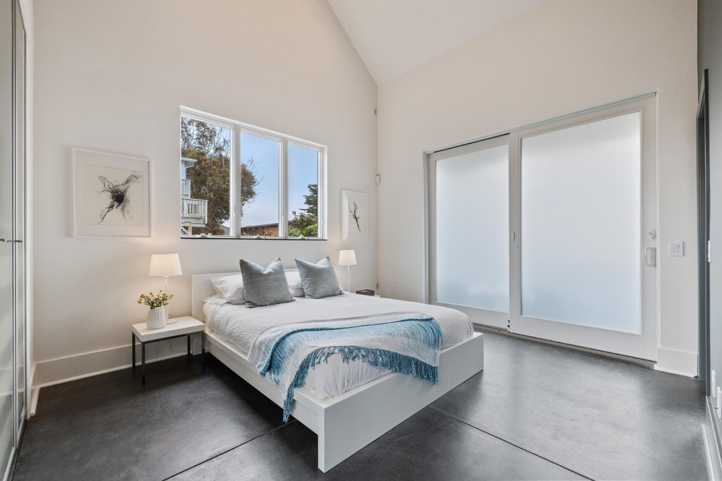 100 Coronado Avenue Half Moon Bay, CA 94019 - Photo 20 of 64 a bedroom with a bed and a window