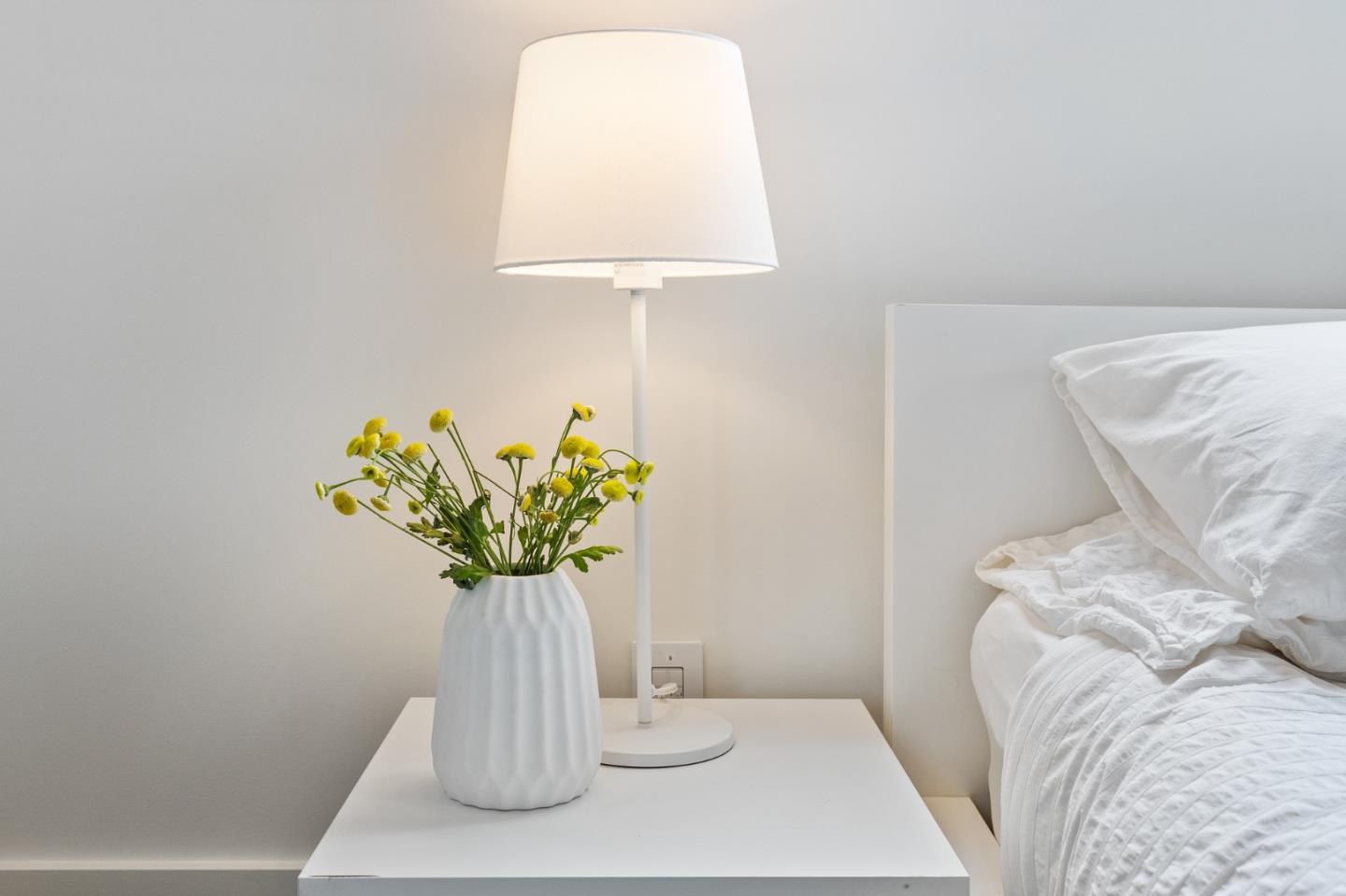 100 Coronado Avenue Half Moon Bay, CA 94019 - Photo 21 of 64 a vase of flowers sitting on a table with a couch