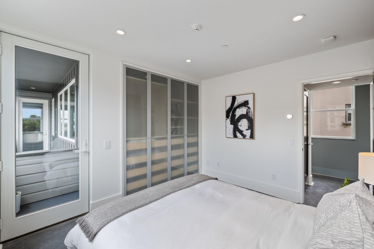 100 Coronado Avenue Half Moon Bay, CA 94019 - Photo 30 of 64 a bedroom with a bed and a window