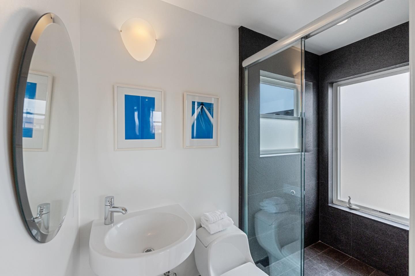 100 Coronado Avenue Half Moon Bay, CA 94019 - Photo 41 of 64 a bathroom with a sink toilet and shower