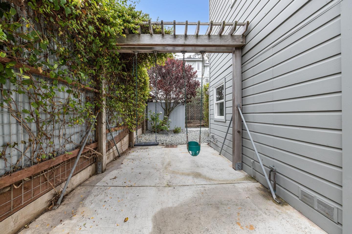 100 Coronado Avenue Half Moon Bay, CA 94019 - Photo 44 of 64 a view of a house with a tree