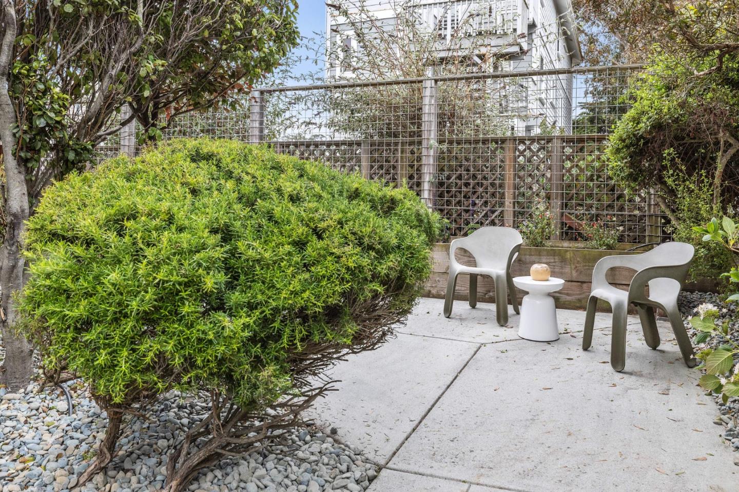 100 Coronado Avenue Half Moon Bay, CA 94019 - Photo 47 of 64 a view of a patio with table and chairs and potted plants