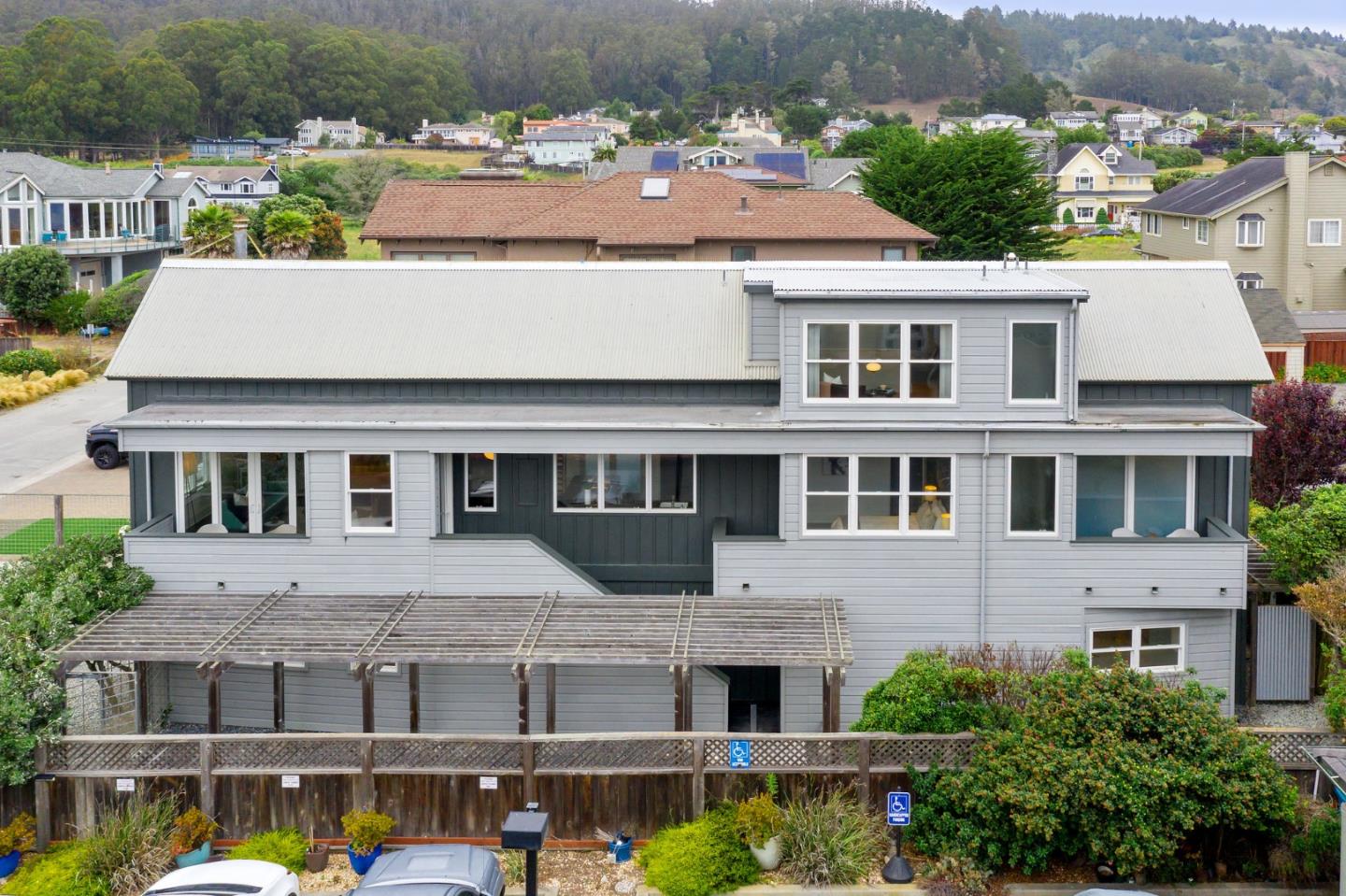 100 Coronado Avenue Half Moon Bay, CA 94019 - Photo 54 of 64 a aerial view of a house with a swimming pool