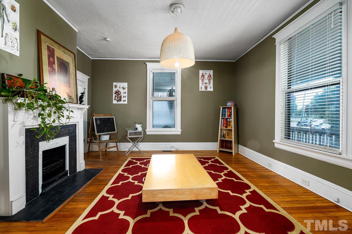 415 New Bern Avenue Raleigh, NC 27601 - Photo 16 of 54 a room with pool table and windows