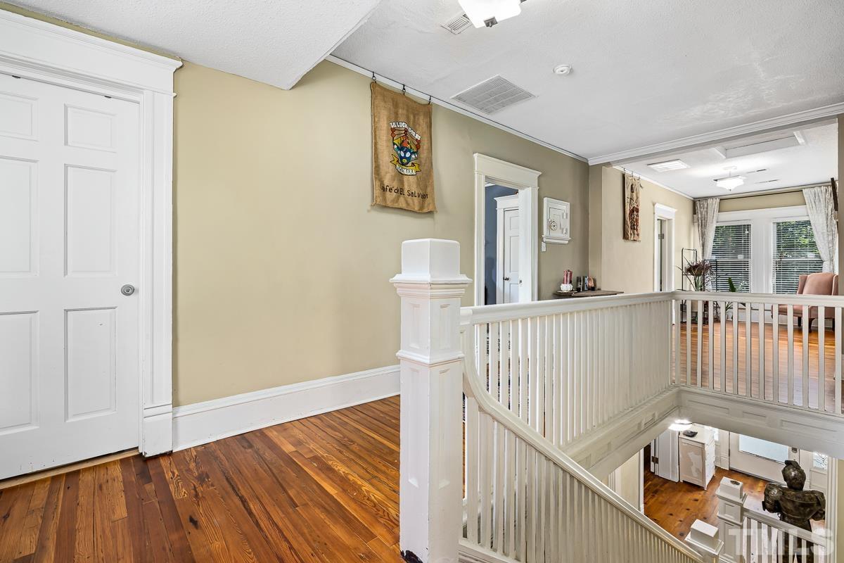 415 New Bern Avenue Raleigh, NC 27601 - Photo 28 of 54 a view of entryway with wooden floor