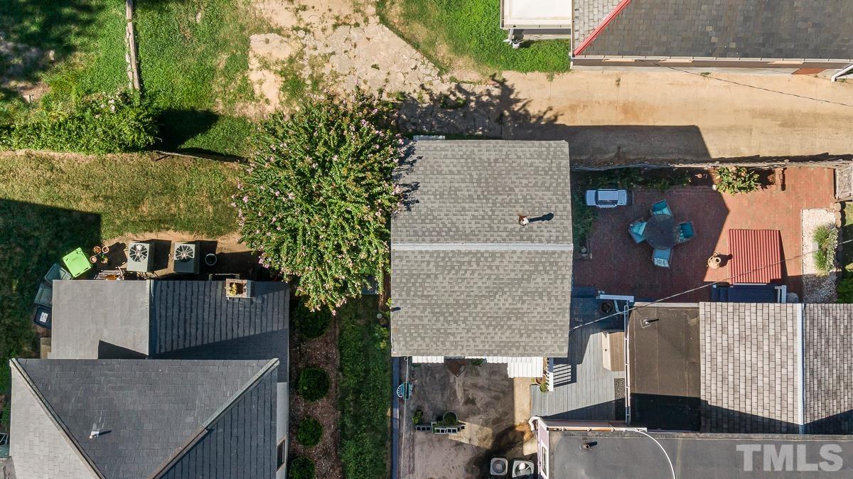 415 New Bern Avenue Raleigh, NC 27601 - Photo 41 of 54 an aerial view of a house with a yard