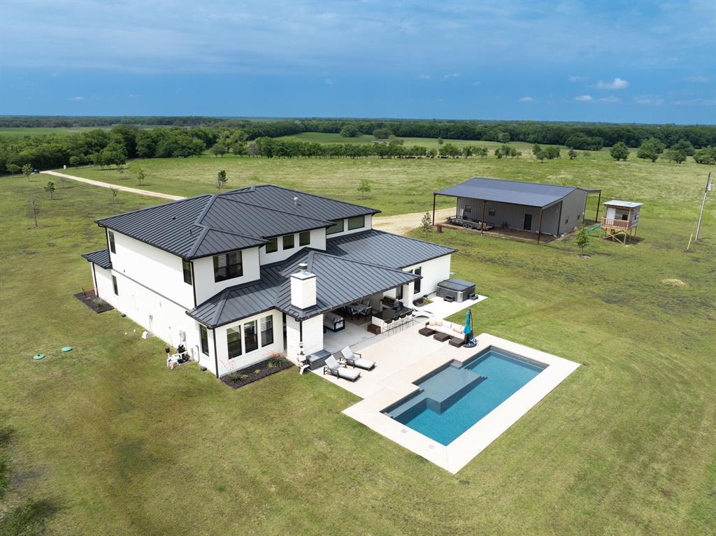 2396 County Road 2145 Cooper, TX 75432 - Photo 37 of 40 an aerial view of a house with a big yard