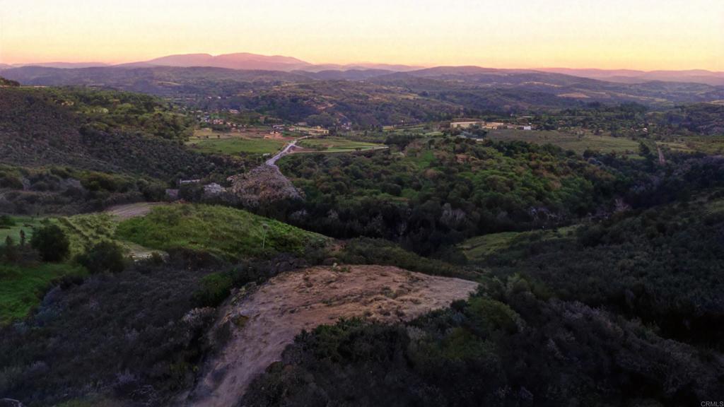 1 El Trio Road Temecula, CA 92590 - Photo 22 of 22 a view of a lush green hillside and a houses