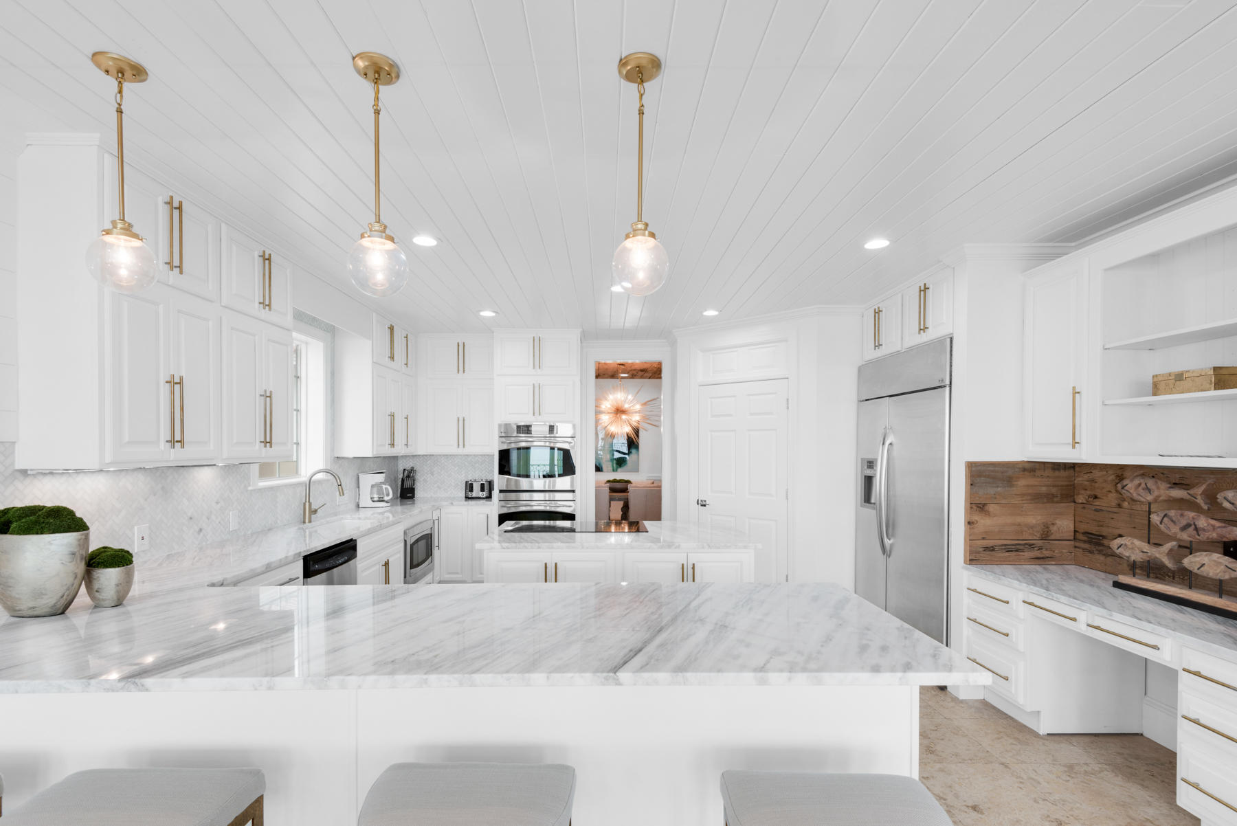 114 Sandprint Circle Destin, FL 32541 - Photo 19 of 100 a kitchen with stainless steel appliances kitchen island granite countertop a sink and a granite counter tops