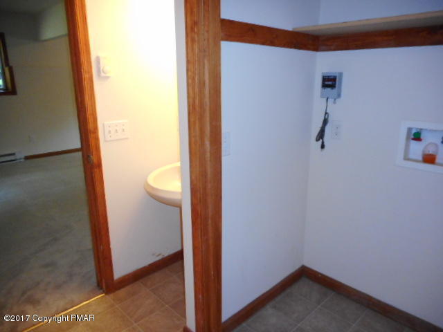 4784 Pine Ridge Drive West Bushkill, PA 18324 - Photo 11 of 14 basement laundry bathroom
