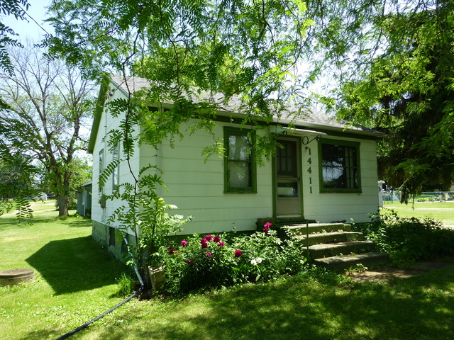 14411 Smith Road Lockport, IL 60441 - Photo 1 of 13 a green field with lots of flowers in it