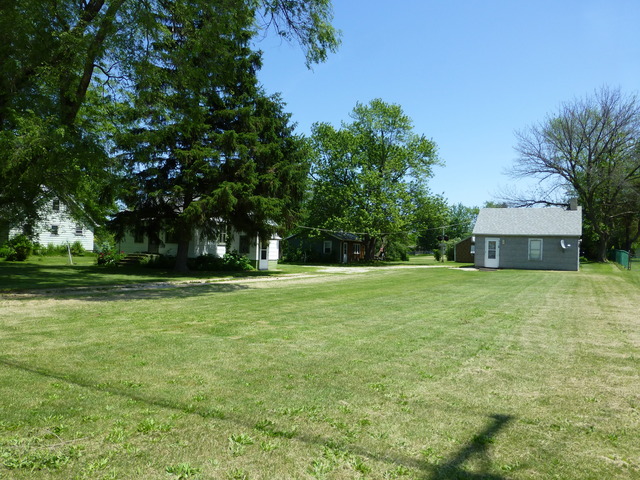 14411 Smith Road Lockport, IL 60441 - Photo 9 of 13 a front view of a house with a yard