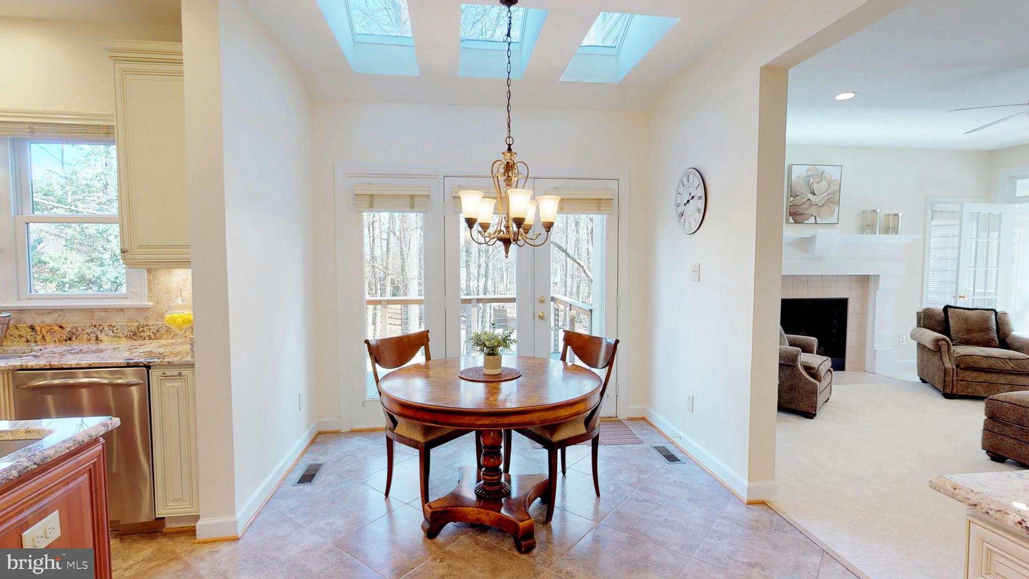 11205 Bright Pond Lane Reston, VA 20194 - Photo 17 of 102 3 Skylights make the Breakfast Room extra Bright!